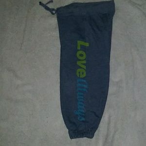 gently used peace sign embellished sweat pants